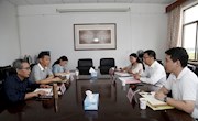 央企国机智骏汽车有限公司党委副书记尹建弘一行来我校交流